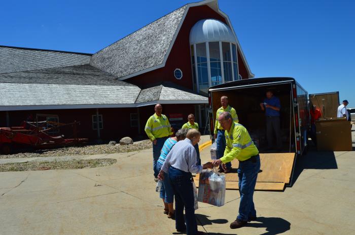 John Tegler greeting members at an Annual Meeting